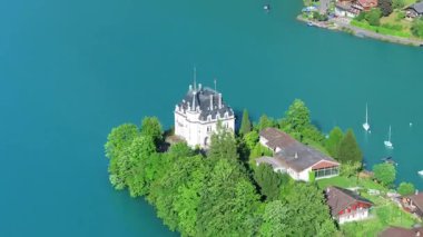 The beautiful Interlaken valley and Thunersee lake, Beatiful river at Switzerland in sunny day during summer, Aereal drone view of stunning idyllic nature scenery of lake Brienz with turquoise waters