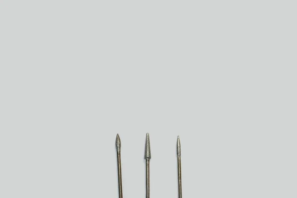 Set of three milling cutters for manicure creating — Stock Photo, Image