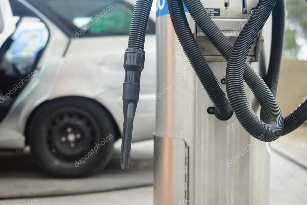 Car self serve coinoperated vacuum cleaner Stock Photo by ©aquarimage
