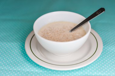 Üstten Görünüm kâse yulaf lapası tablo arka plan üzerinde üzerinde. Sağlıklı kahvaltı