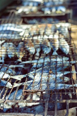 Portre üzerinde bir ızgara balık