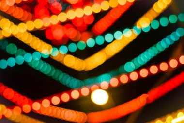 Soyut dairesel bokeh arka plan koyu arka plan üzerinde ışıkları