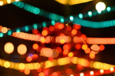 Soyut dairesel bokeh arka plan koyu arka plan üzerinde Noel ağacı ışıkları