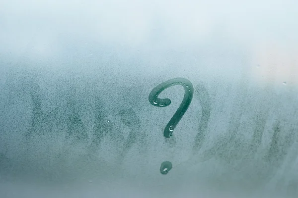 The inscription on glass, question mark concept — Stock Photo, Image