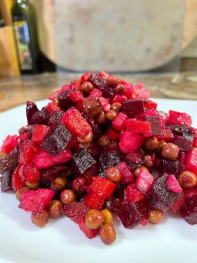Vinaigrette - Ukrainian vegetable salad made from boiled beets, carrots and potatoes with the addition of onions, green peas, pickles and oil
