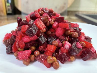 Vinaigrette - Ukrainian vegetable salad made from boiled beets, carrots and potatoes with the addition of onions, green peas, pickles and oil