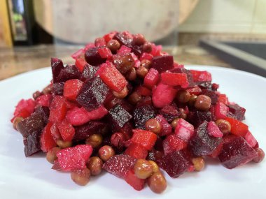 Vinaigrette - Ukrainian vegetable salad made from boiled beets, carrots and potatoes with the addition of onions, green peas, pickles and oil