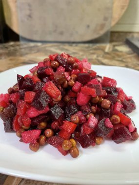 Vinaigrette - Ukrainian vegetable salad made from boiled beets, carrots and potatoes with the addition of onions, green peas, pickles and oil