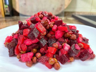 Vinaigrette - Ukrainian vegetable salad made from boiled beets, carrots and potatoes with the addition of onions, green peas, pickles and oil
