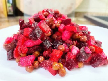 Vinaigrette - Ukrainian vegetable salad made from boiled beets, carrots and potatoes with the addition of onions, green peas, pickles and oil
