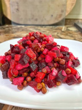 Vinaigrette - Ukrainian vegetable salad made from boiled beets, carrots and potatoes with the addition of onions, green peas, pickles and oil