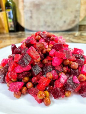 Vinaigrette - Ukrainian vegetable salad made from boiled beets, carrots and potatoes with the addition of onions, green peas, pickles and oil