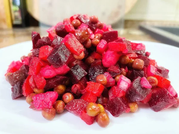 Vinaigrette - Ukrainian vegetable salad made from boiled beets, carrots and potatoes with the addition of onions, green peas, pickles and oil