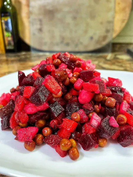 Vinaigrette - Ukrainian vegetable salad made from boiled beets, carrots and potatoes with the addition of onions, green peas, pickles and oil