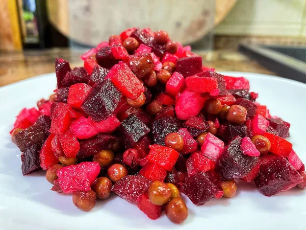 Vinaigrette - Ukrainian vegetable salad made from boiled beets, carrots and potatoes with the addition of onions, green peas, pickles and oil