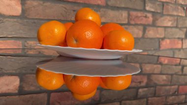 portakal ve mandalina meyveleri masada.