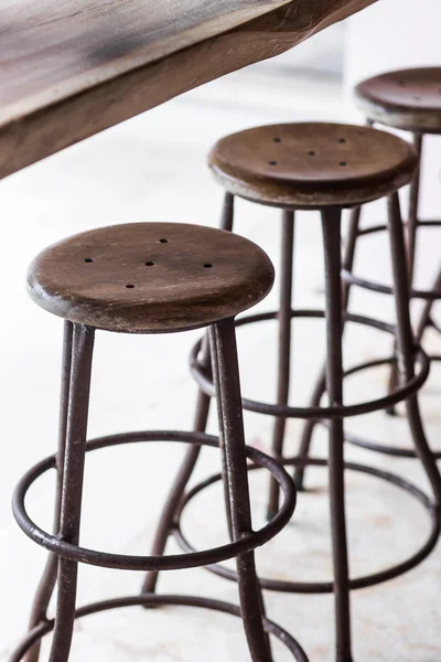 Bar with wooden vintage round tall chairs — Stock Photo, Image