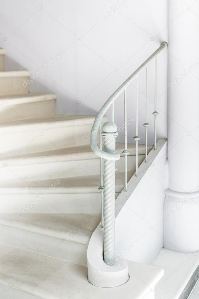 White stairs with vintage white railing