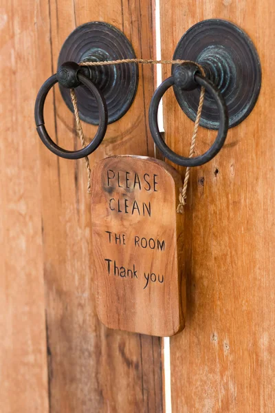 Wooden plate with sign — Stock Photo, Image