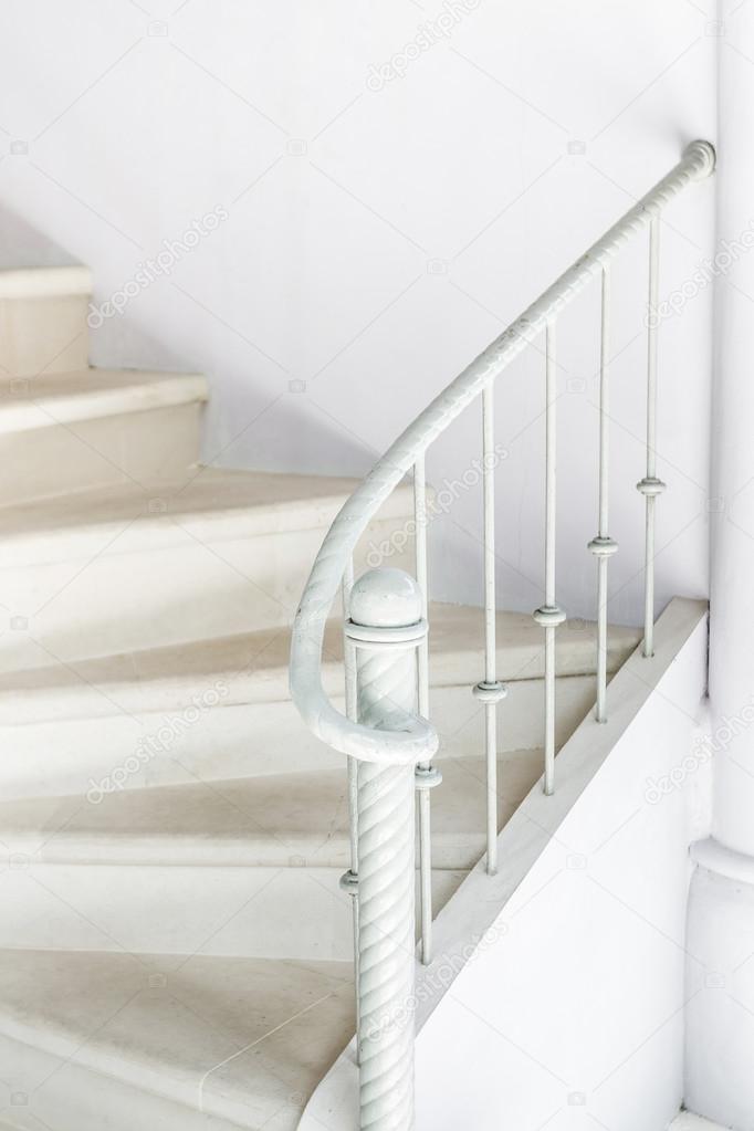 White stairs with railing