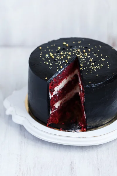 Round black cake — Stock Photo, Image