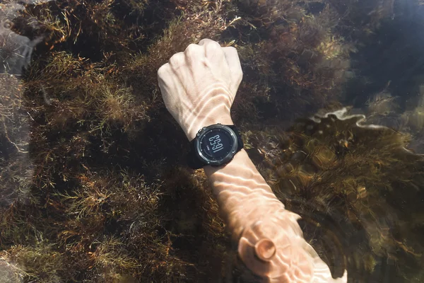 Waterproof sport watches on hand — Stock Photo, Image