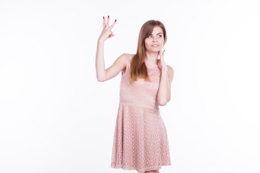 girl showing three fingers