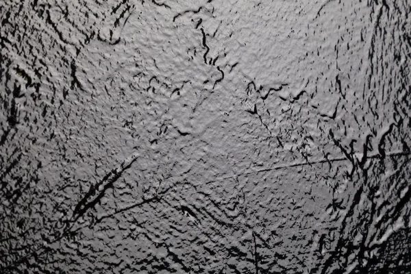 black textured wall in studio