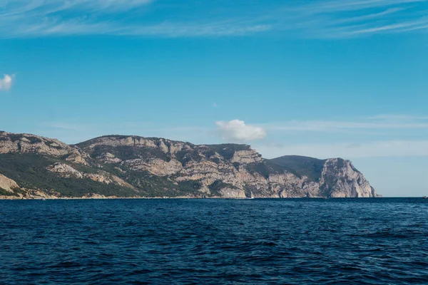 beautiful landscape sea high mountains and blue sky