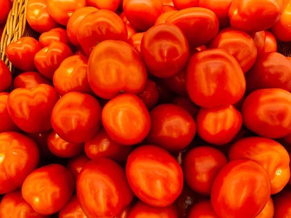Reifes rotes Tomatengemüse zum Essen als Hintergrund — Stockfoto