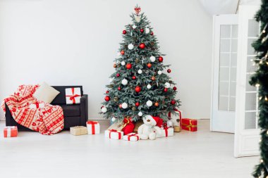 The interior of the white room Christmas tree New Year holiday gifts decor
