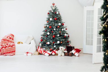 The interior of the white room Christmas tree New Year holiday gifts decor