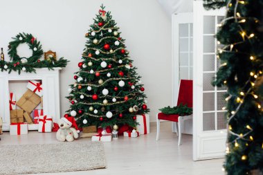 decor fireplace and Christmas tree holiday gifts new year background
