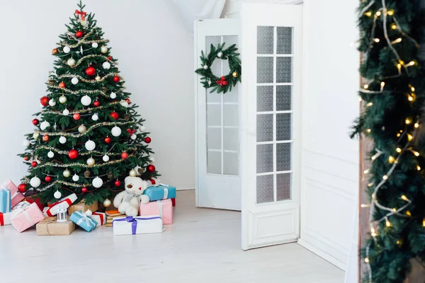 Decor interior of the house Christmas tree holiday presents new years background — Stok fotoğraf