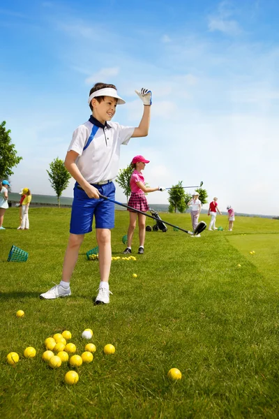 Děti golf škola — Stock fotografie