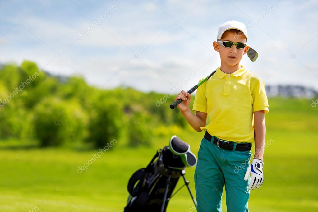 Portrait of boy golfer