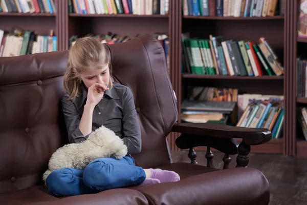 Depressed child with toy — Stock Photo, Image