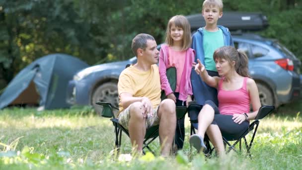 Happy Young Family Enjoying Time Capmsite Outdoors Parents Children Chatting — Stock Video