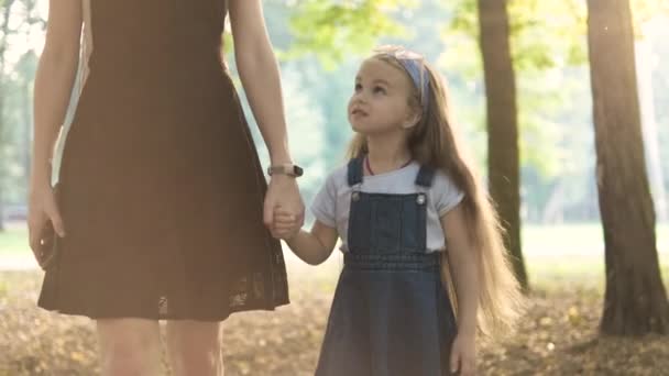 Mom Her Little Daughter Child Walking Together Holding Hands Summer — Stock Video