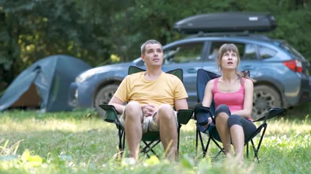 Young Couple Sitting Campsite Talking Happily Enjoying Time Together — Stock Video