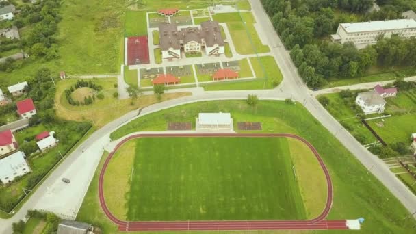 Vista Aérea Estádio Esportes Com Pistas Corrida Vermelhas Campo Futebol — Vídeo de Stock