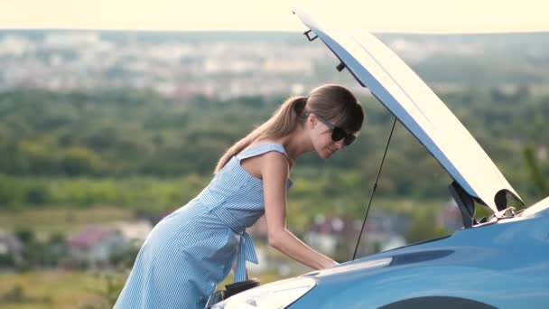 Young Woman Driver Standing Broken Car Open Hood Having Trouble — Stock Video