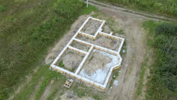 Luchtfoto Van Bouwwerkzaamheden Van Nieuwe Betonnen Fundering Bouwplaats — Stockvideo