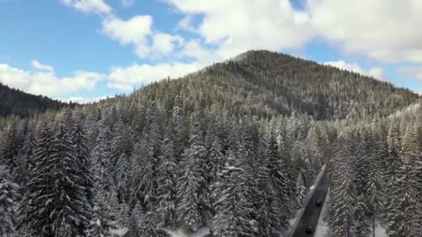 Aerial View Winter Landscape Snow Covered Mountain Hills Winding Forest — Stock Video
