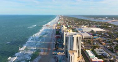 Cityscape of Daytona Beach, Florida. Luxury coastal living with hotels, condominiums and tourist amenities in developed seaside town