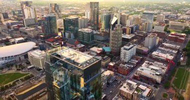 Nashville city urban environment in Tennessee, USA. Evening view from above of skyscraper buildings in downtown district. American metropolitan area with business financial district