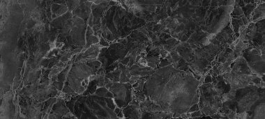 Siyah mermer taş yapısı, doğal arkaplan.