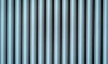 Abstract gray background of vertical pipes with volume