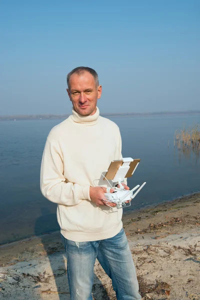 Dnepropetrovsk Ukraine, November 5, 2015: A  man with remote con — Stock Photo, Image