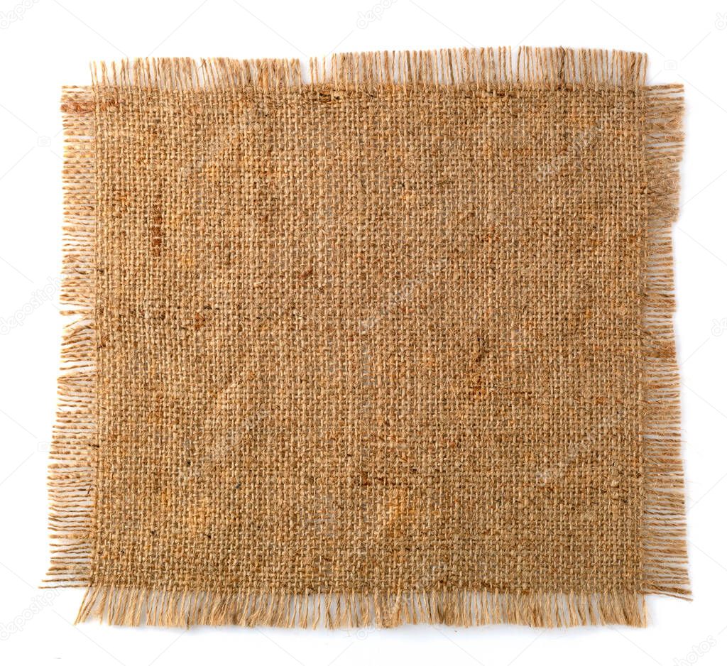 A piece of old natural fabric on a white background